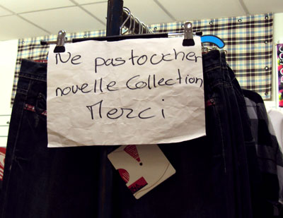 French shopper sign: do not touch the new collection
