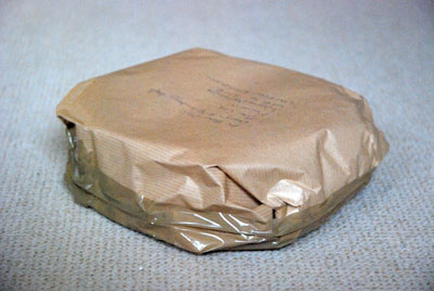 Brown paper-wrapped package in Haute Savoie, France, copyright Wendy Hollands