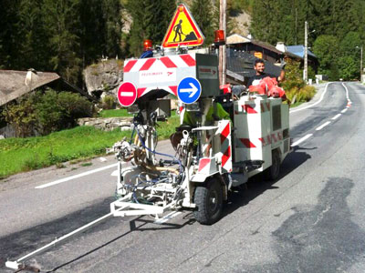 <Photo of a man painting roads in rural France (thanks to Richie - twitter.com/247snowman)>