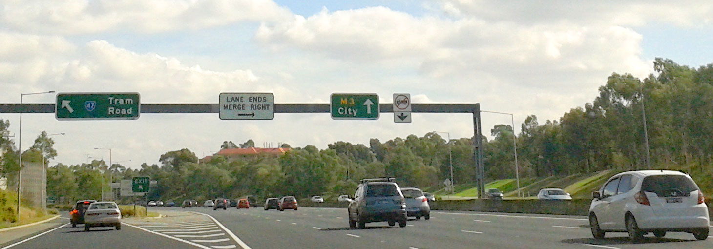 Melbourne's Eastern Freeway - merge left sign