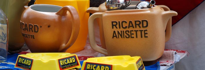 <Photo of Ricard jugs at a vide grenier in Le Grand Bornand, France'>