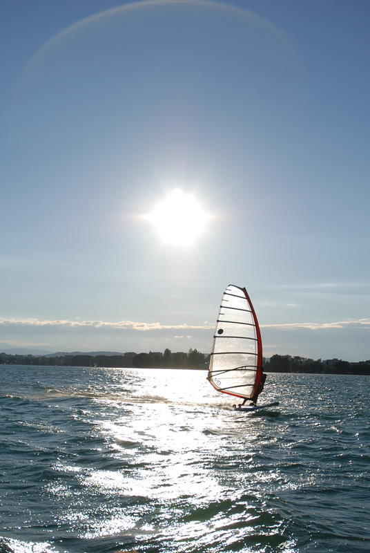 Windsurfer on Lake Annecy, France. Copyright Wendy Hollands.